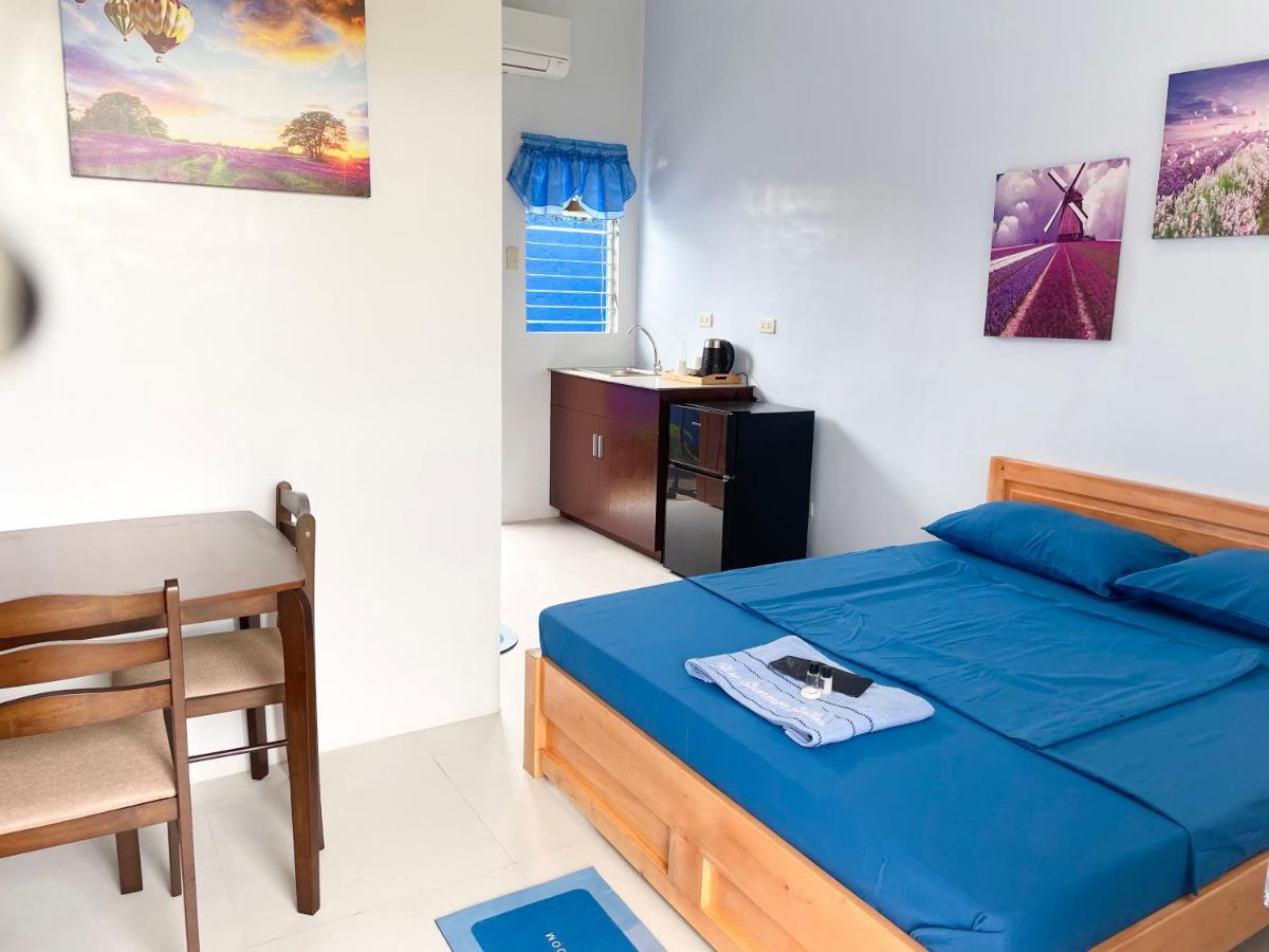 Blue Summer Suites & Restaurant Bingag Bagian luar foto