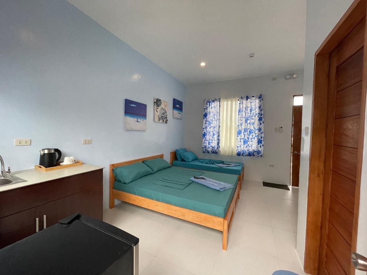 Blue Summer Suites & Restaurant Bingag Bagian luar foto