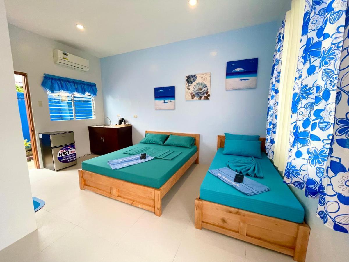 Blue Summer Suites & Restaurant Bingag Bagian luar foto